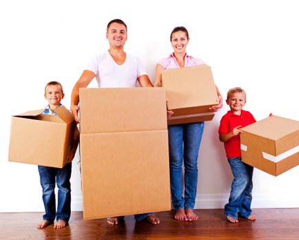 Moving day checklist and packed boxes ready for collection