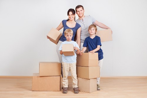 Office furniture and boxes prepared for a local commercial move