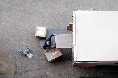 Removal van and moving team in Crystal Palace residential street
