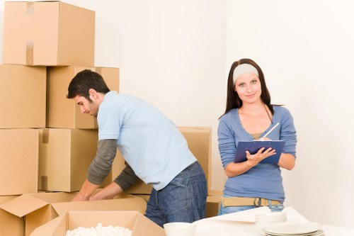 Packed moving boxes ready for a local house relocation