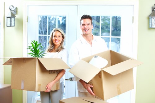 Commercial moving equipment and packed office items for a local Crystal Palace business relocation